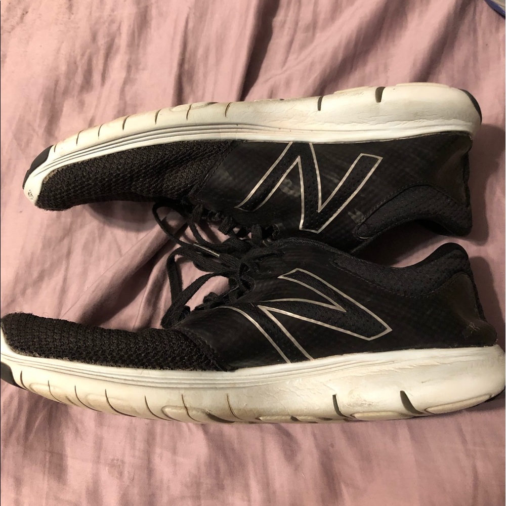 New Balance black athletic shoes